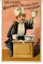 Celluloid Trade Card featuring a blond boy standing at a wash basin holding a cuff, boy is wearing a cuff on his head